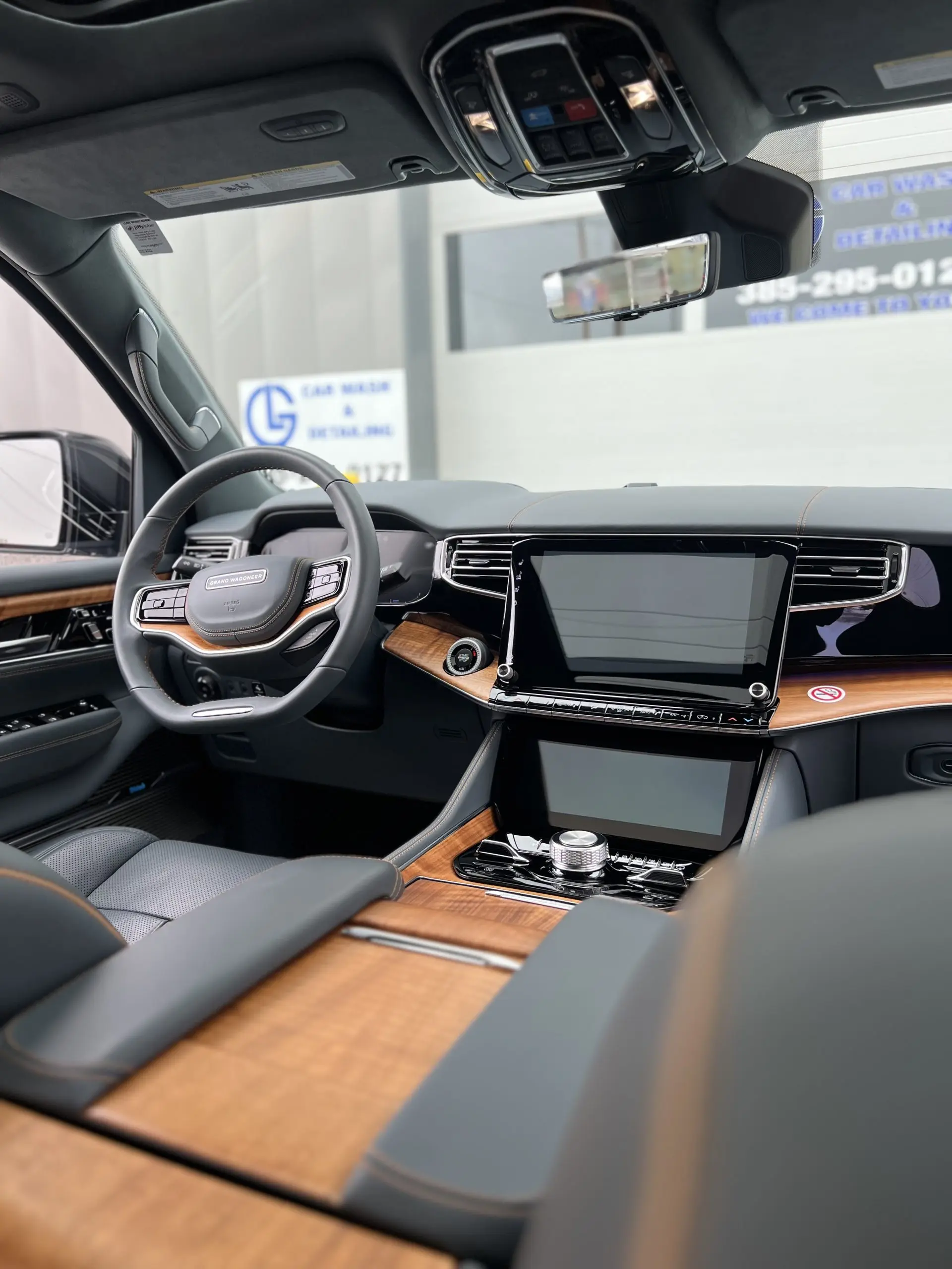 Freshly detailed luxury SUV dashboard and front cabin